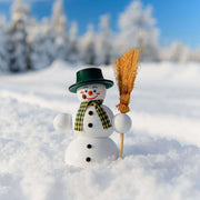 Handcrafted Seiffener Volkskunst Classic snowman incense smoker wearing a black top hat, checked scarf and holding a wooden broom, made in Seiffen, Germany.