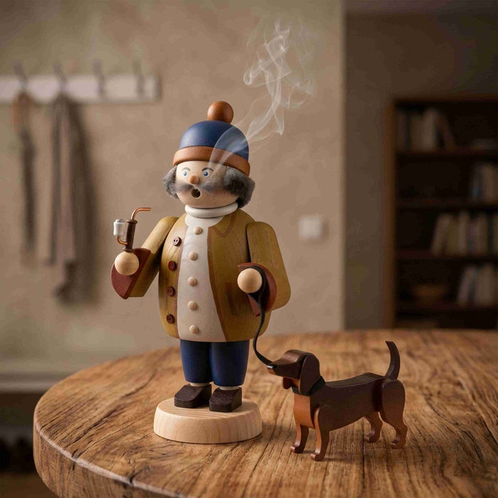 Handcrafted Seiffener Volkskunst Dog Walker incense smoker with a Dachshund, smoking pipe and traditional clothing, made in Seiffen, Germany.