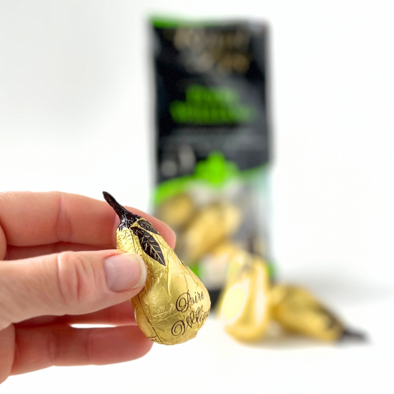 Abtey Williams Pear liqueur chocolates shaped like pears and wrapped in foil, made with dark chocolate in France.