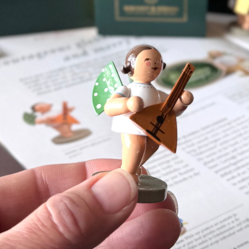 Wendt & Kühn Grünhainichen Angel with Balalaika handcrafted wooden angel figurine with green wings and eleven white dots, made in Germany 650/77
