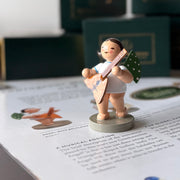 Wendt & Kühn Grünhainichen Angel with Balalaika handcrafted wooden angel figurine with green wings and eleven white dots, made in Germany 650/77