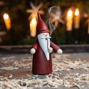 Handcrafted Seiffener Volkskunst Red Gnome incense smoker with a tall red hat, white beard and traditional pipe, made in Seiffen, Germany.
