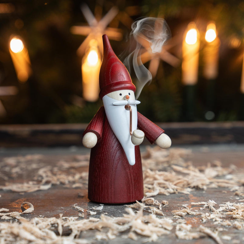Handcrafted Seiffener Volkskunst Red Gnome incense smoker with a tall red hat, white beard and traditional pipe, made in Seiffen, Germany.