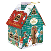 Heidel Christmas Gnome embossed metal gift tin shaped like a festive gnome cottage with removable roof, wire handle, and assorted German chocolates inside.