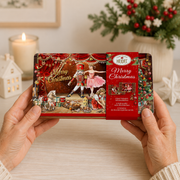 Heidel Fairy Tale embossed chocolate gift tin with Nutcracker scene and nine individually wrapped German milk chocolate bars.