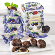 Heindl Powidltaler gift cube with individually wrapped dark chocolates filled with Austrian plum preserve and marzipan.