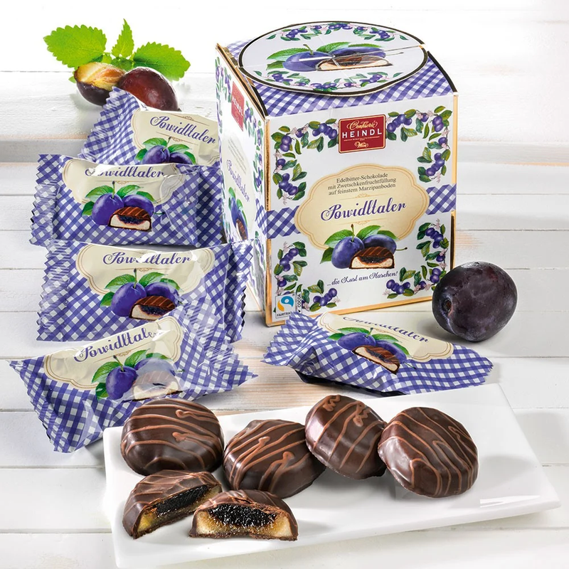 Heindl Powidltaler gift cube with individually wrapped dark chocolates filled with Austrian plum preserve and marzipan.