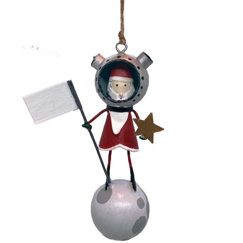Handmade tin Santa on the Moon Christmas ornament wearing an astronaut suit, designed in Denmark and handcrafted in the Philippines.