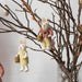 Gingerbread World European Easter Market - Gry and Sif Felted Wool Ornaments - Easter Bunny Figures hanging on branches in vase
