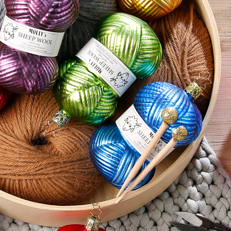 Gingerbread World Inge-Glas Canada - Mouthblown Glass from Germany - Knitting Ornament Ball of Blue Yarn with Needles in basket with other knitting ornaments