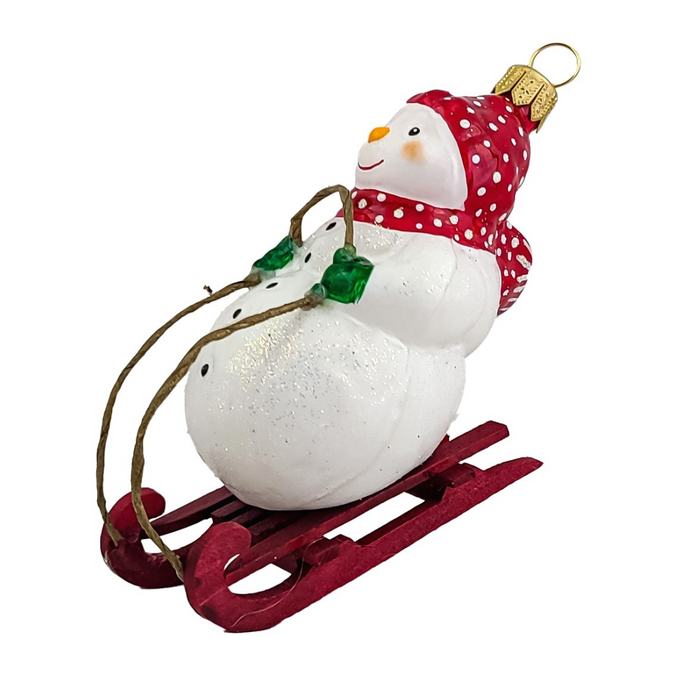 Gingerbread World Polish Blown Glass Ornament – Snowman on Toboggan 162905