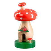 Handcrafted Richard Glässer German toadstool house incense smoker with a red mushroom roof, crooked chimney and ladybug, made in Seiffen, Germany.