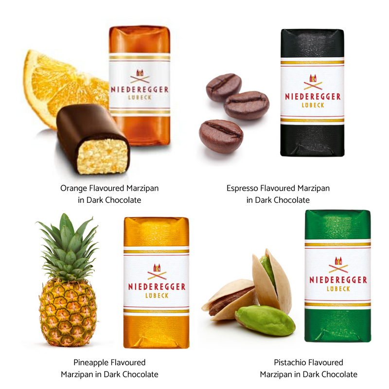 Niederegger Lübeck Marzipan Variations Gift Box with 16 individually wrapped assorted mini marzipan loaves coated in dark chocolate.