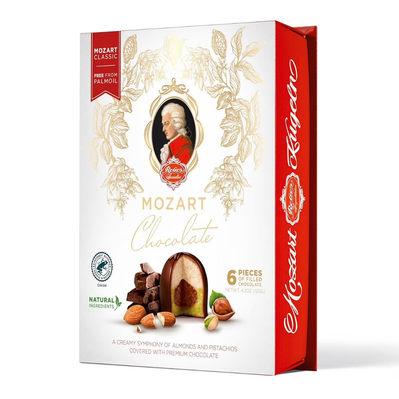 Reber Mozart-Kugeln gift box with six authentic Mozart Balls made with pistachio marzipan, hazelnut nougat and dark chocolate.