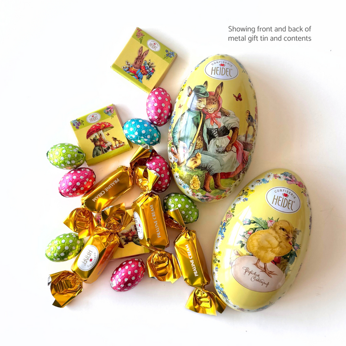 Gingerbread World European Market - Confiserie Heidel Egg-shaped metal gift tin showing front and back and chocolates