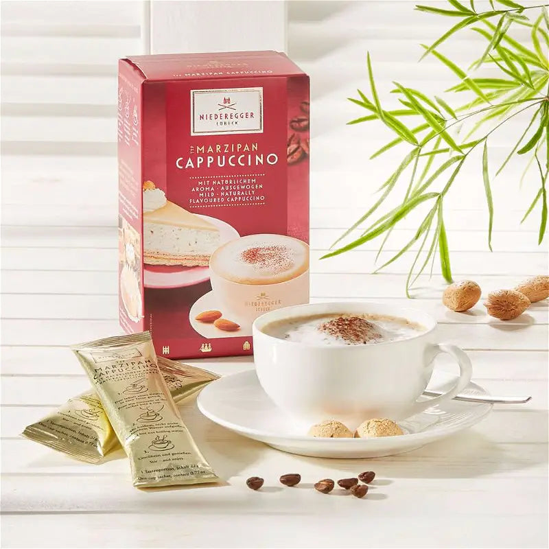 Niederegger Lübeck Marzipan Cappuccino with 10 individual sachets of premium German cappuccino mix.