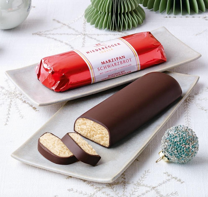 Niederegger Lübeck Marzipan Loaf in Dark Chocolate (Marzipan Brot), 75 g, wrapped in signature red foil and imported from Germany.