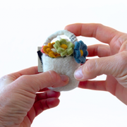 Gry & Sif felted wool miniature flower basket handmade from New Zealand wool with colourful spring flowers.