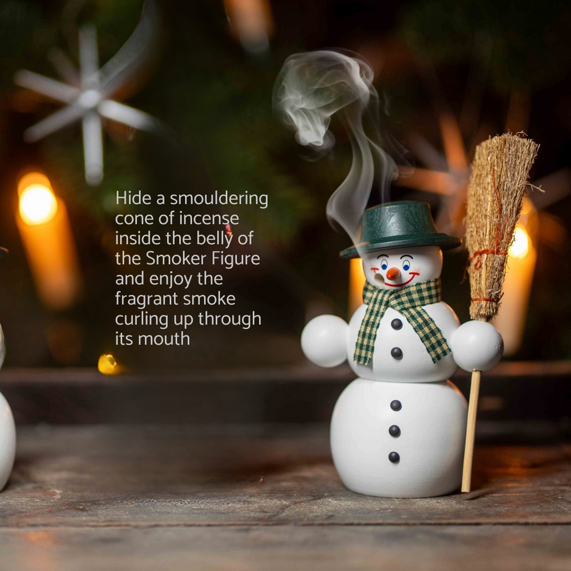 Handcrafted Seiffener Volkskunst Classic snowman incense smoker wearing a black top hat, checked scarf and holding a wooden broom, made in Seiffen, Germany.
