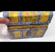 Gemstone Treasure Box Advent Calendar with 24 real polished gemstones hidden behind numbered doors in a pirate-style keepsake chest.