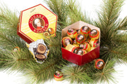 Victor Schmidt Mozart Kugeln gift box with 18 authentic Austrian Mozart Balls made with marzipan, hazelnut nougat and chocolate.