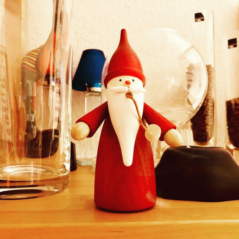 Handcrafted Seiffener Volkskunst Red Gnome incense smoker with a tall red hat, white beard and traditional pipe, made in Seiffen, Germany.