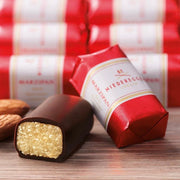 Niederegger Lübeck Marzipan Classics Gift Box with 16 individually wrapped mini marzipan loaves in dark chocolate.