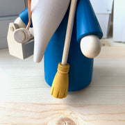 Handcrafted Seiffener Volkskunst Handyman Gnome incense smoker with a brown hat, blue coat, miniature toolbox and broom, made in Seiffen, Germany.