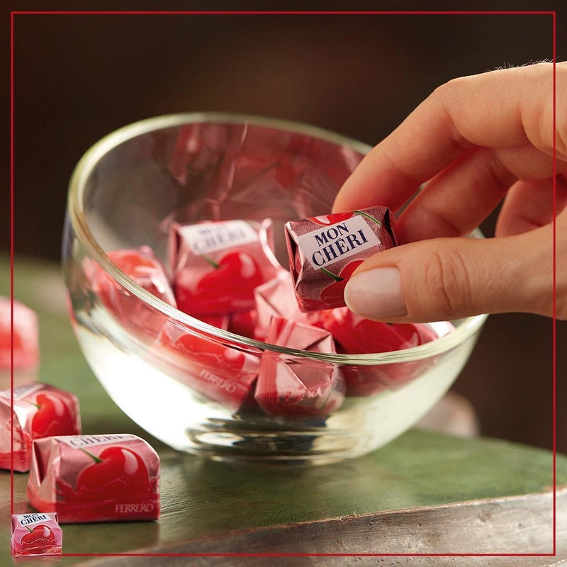 Ferrero Mon Chéri dark chocolate pralines filled with whole cherries and cherry liqueur, 15-piece gift box.