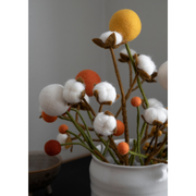 Gingerbread World European Market - Gry and Sif Felted Wool Cotton Branch shown with other felted flowers in vase on desk 12812