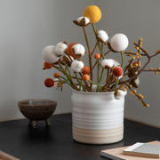 Gingerbread World European Market - Gry and Sif Felted Wool Cotton Branch shown with other felted flowers in vase on desk