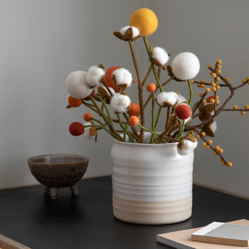 Gingerbread World European Market - Gry and Sif Felted Wool Cotton Branch shown with other felted flowers in vase on desk