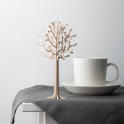 Gingerbread World European Market - Lovi Wooden Creations from the Forests of Finland - Tree 16.5 cm natural wood on table with dishes