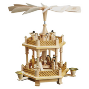 Handcrafted Richard Glässer German two-tier Christmas pyramid featuring the Nativity scene with the Holy Family, angels and Wise Men, made in Seiffen, Germany.