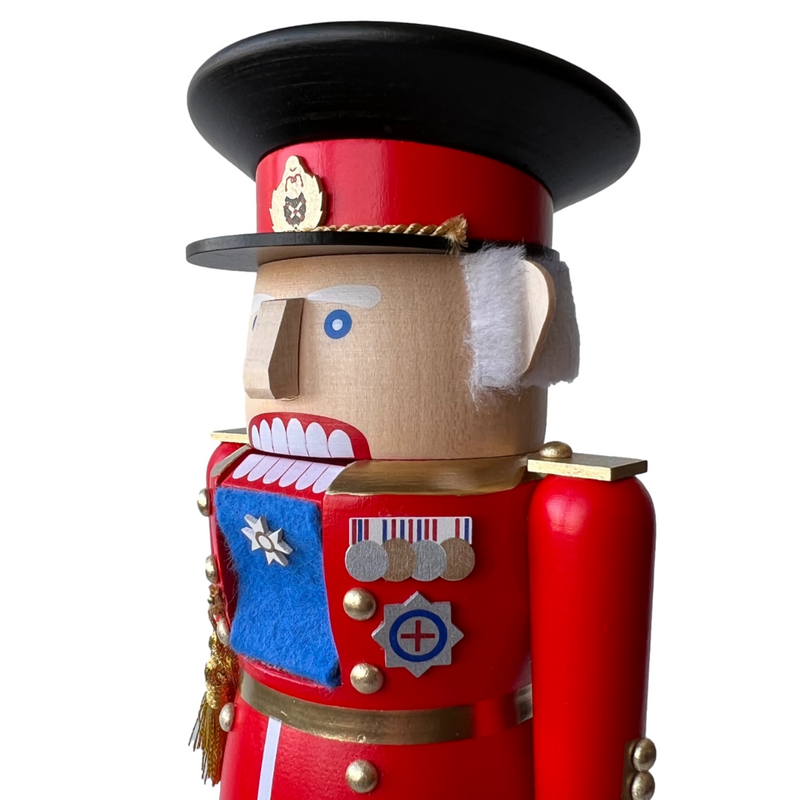 Handcrafted Richard Glässer German nutcracker depicting King Charles III, made in Seiffen, Germany.