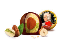 Reber Mozart-Kugeln gift box with six authentic Mozart Balls made with pistachio marzipan, hazelnut nougat and dark chocolate.