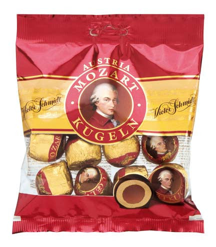 Authentic Austrian Victor Schmidt Mozart Kugeln with layers of marzipan, hazelnut nougat and chocolate. Convenient 9-piece cello bag.