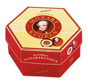 Victor Schmidt Mozart Kugeln gift box with 18 authentic Austrian Mozart Balls made with marzipan, hazelnut nougat and chocolate.