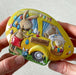 Gingerbread World European Market - Confiserie Heidel Easter Tin in shape of campervan with milk chocolate