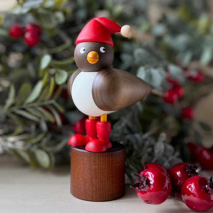 Gingerbread World Drechslerei Martins German Handcrafted Wood Seagull Figures - Seagull with Santa Hat standing 081 Grey
